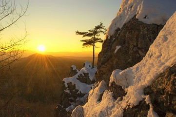 Wall Mural - Winter sunset in the mountains. Bolshekhekhtsirsky Nature Reserve.  Khabarovsk region, far East, Russia. 