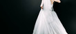 © velimir - Wedding clothing newlyweds. Elegant bride and groom on a dark background.