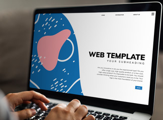 working on a web template on the laptop