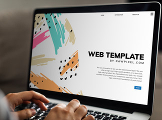 Wall Mural - working on a web template on the laptop