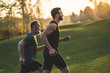 © realstock1 - The two sportsmen running on the grass