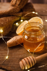 Ingredients for making flu fighting natural hot drink Closeup - lemon, ginger root, honey