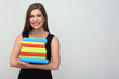 © Yuriy Shevtsov - Happy student girl holding pile of books.
