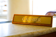 Cashier Sign On The Store