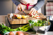 © karepa - Young Woman Cooking in the kitchen. Healthy Food for Christmas (stuffed duck or Goose)