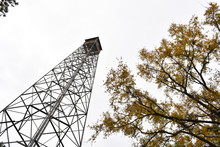 Looking Up At A Fire Tower In The Fall