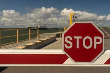 Stop sign in the terminal of the port of Baltic