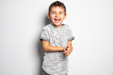 boy having fun on studio white background