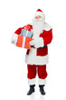 © LIGHTFIELD STUDIOS - santa claus with white beard holding christmas presents isolated on white