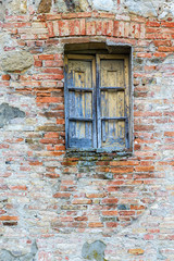 Sticker - Old weathered window on a brick wall