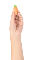 Sticker - hand holding carrot of rubber erasers isolated on white background