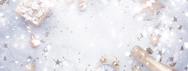 christmas or new year composition, frame, gray background with gold christmas decorations, stars, sn