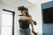 © Stocksy - Blond girl playing VR game