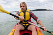 © Stocksy - A man paddling his kayak around Ku-ring-gai Chase NP