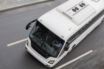 Wall Mural - tourist bus on a multi-lane road.