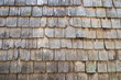 © lazyllama - Old weathered wood shingle roof in a traditional full frame textured background