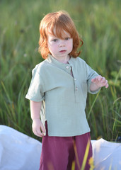 portrait of a little boy in nature