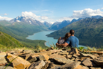 Couple in Love on a Hill Overlooking a Lake