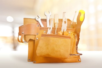 Canvas Print - Tool belt with tools on light background