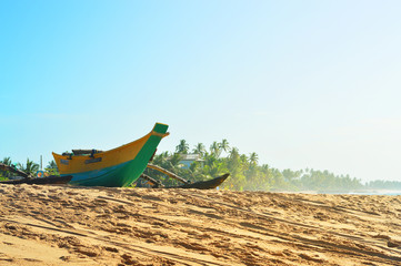 The view on the beach of the island of Ceylon in the Indian ocean