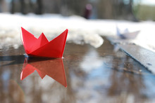 Paper Boat In A Pool