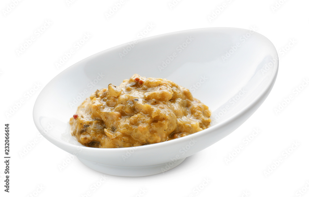 Plate with tasty sauce on white background