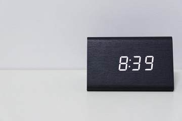 Black digital clock on a white background showing time 8:39