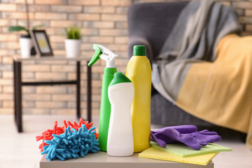 Cleaning supplies on table indoors