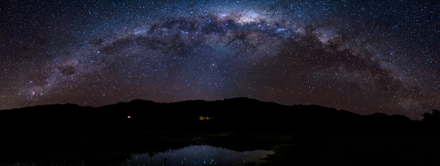 Panorama Starry night Milky way over the mountain. Abel Tasman National Park.