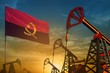 Angola oil industry concept. Industrial illustration - Angola flag and oil wells against the blue and yellow sunset sky background - 3D illustration