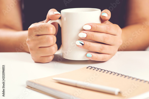 Download Girl With Beautiful Manicure Hold White Cup In Hand Mockup For Designs Woman Hand Hold Cup Of Tea Female Working Desk Stock Photo Adobe Stock