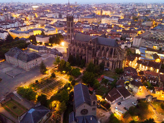 Wall Mural - Historical aerial view of Limoges Cathedral illuminated at dusk, France