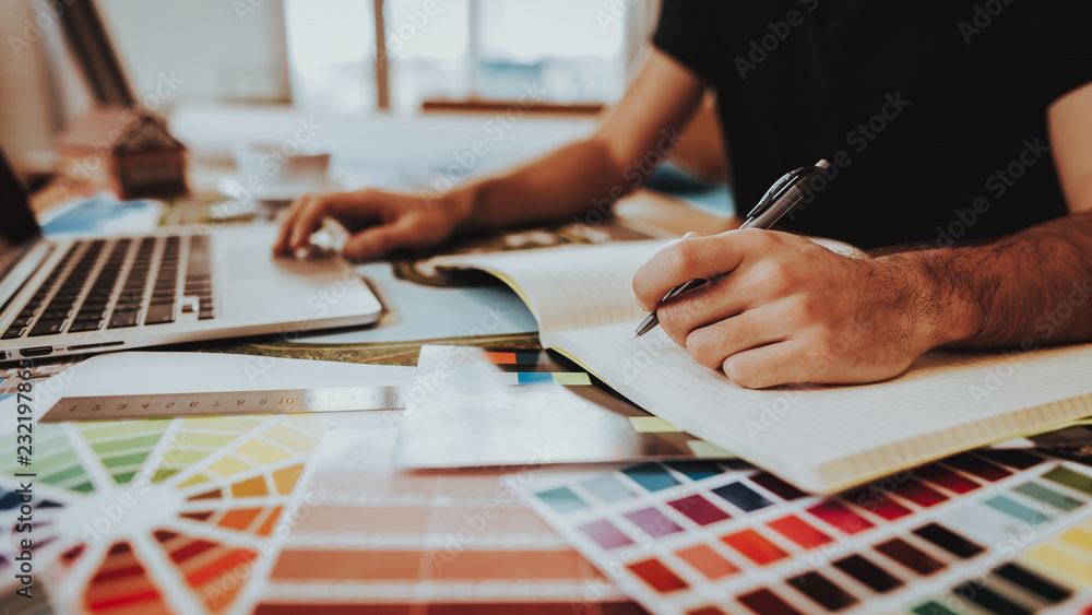 Side View of Graphic Designer Working on Project