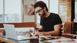 © VadimGuzhva - Graphic Designer Concentrated on Work Project
