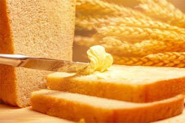 Sticker - Slices of bread with butter on wheat