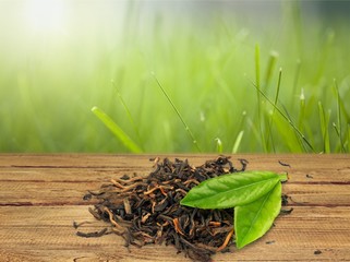 Sticker - Tea and leaves isolated on white background