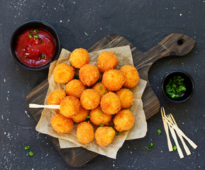 Wall Mural - cheese balls with tomato sauce.