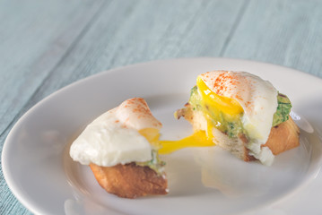 Poster - Cut sandwich with guacamole and poached egg