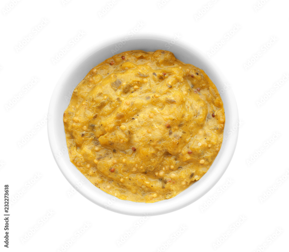 Tasty sauce in bowl on white background