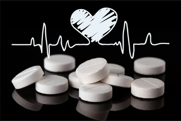 Canvas Print - Pile of pills and heart sign