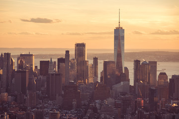 New York City - Manhattan downtown skyline skyscrapers at sunset and twilight. View from Empire State Building Platform. USA.