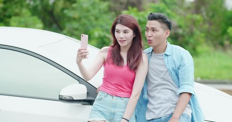 Wall Mural - young couple take a selfie