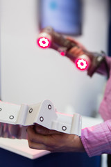 Leinwandbilder - Engineer scans the detail with 3D scanner