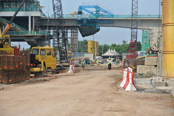 Wall Mural - Construction site in progress Malaysia during daytime. Daily activity is ongoing. 