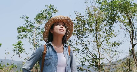 Wall Mural - Woman enjoy hiking in autumn season