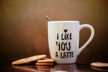 Wall Mural - Coffee latte and cookies with white mug and the text i like you a latte