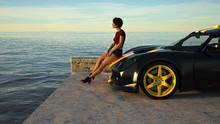 Young Woman Sitting On Her Sports Car Near The End Of A Pier At Sunset.