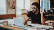 © VadimGuzhva - Portrait of Guy Sitting at Desk Works at Project