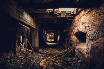 Wall Mural - Dark corridor in ruined abandoned brick factory interior, creepy way to freedom and horror concept