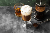 Irish coffee with whisky on dark background. Copy space. Food background